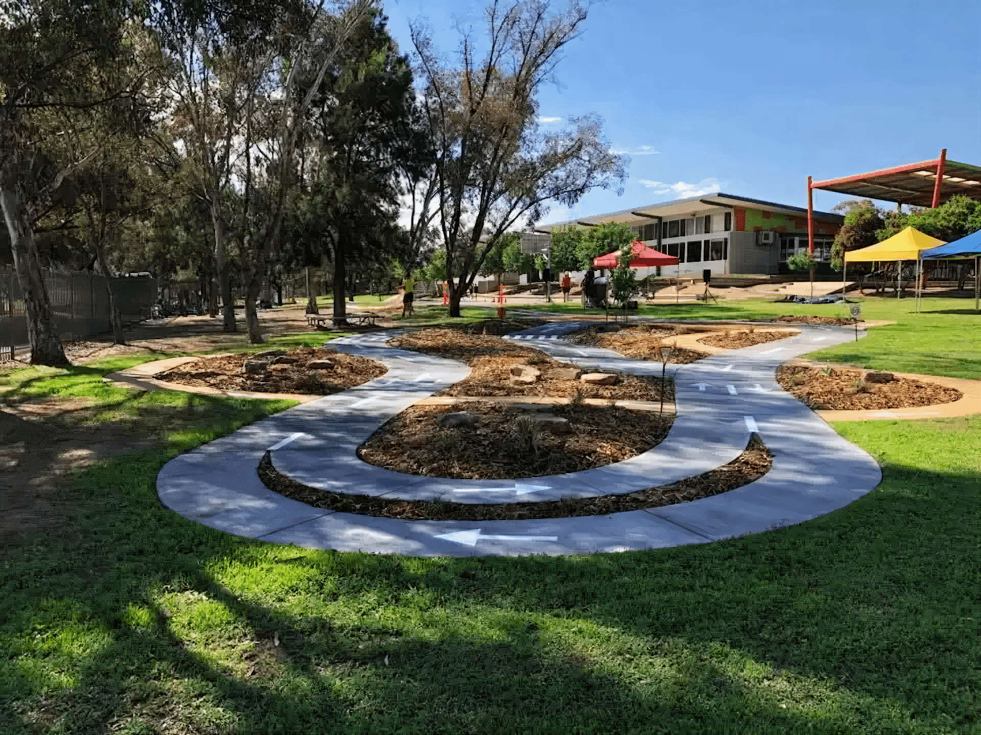 Concrete road and play area by Dan and Dan Landscaping