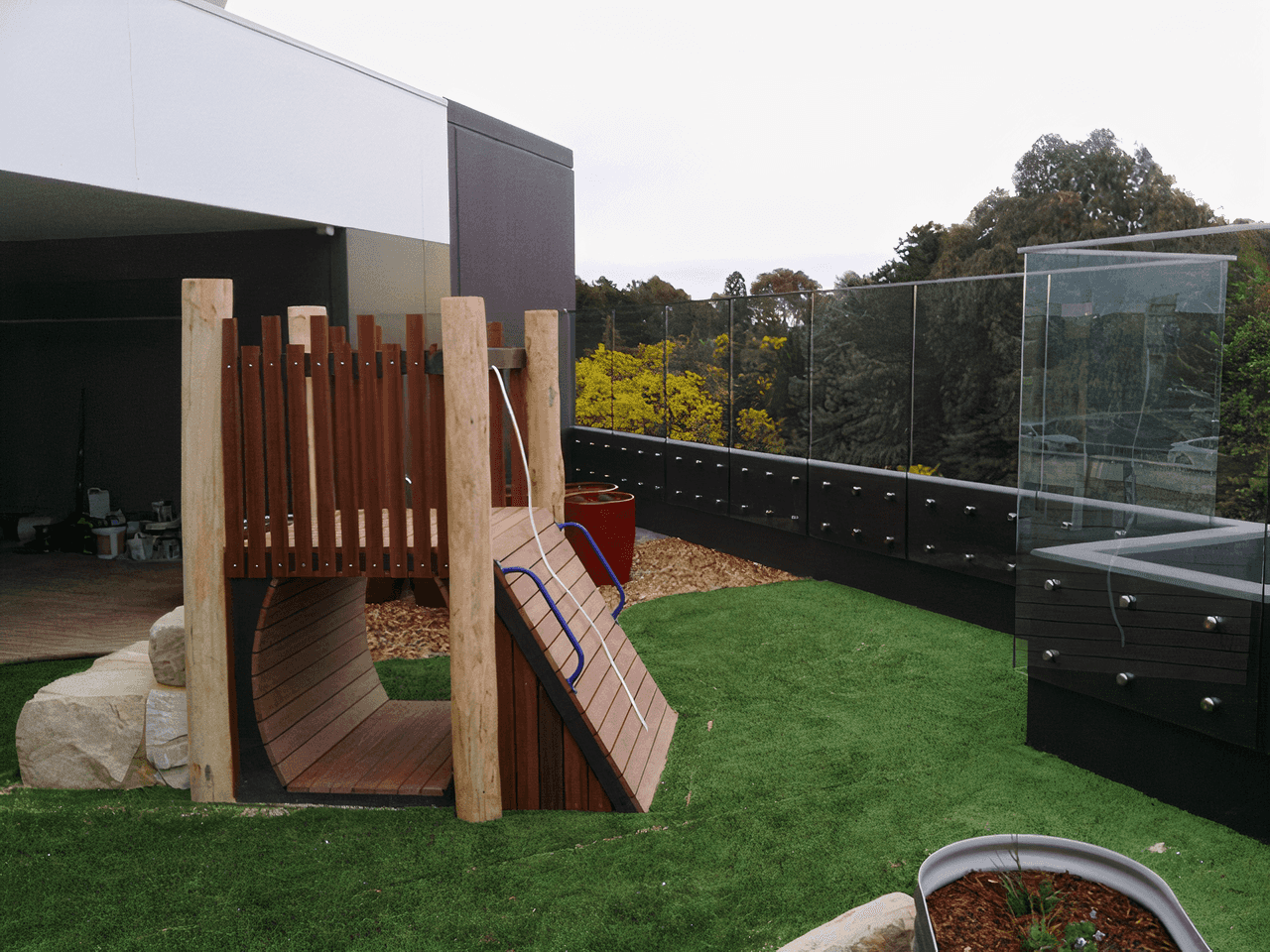 Playground with wooden climbing area