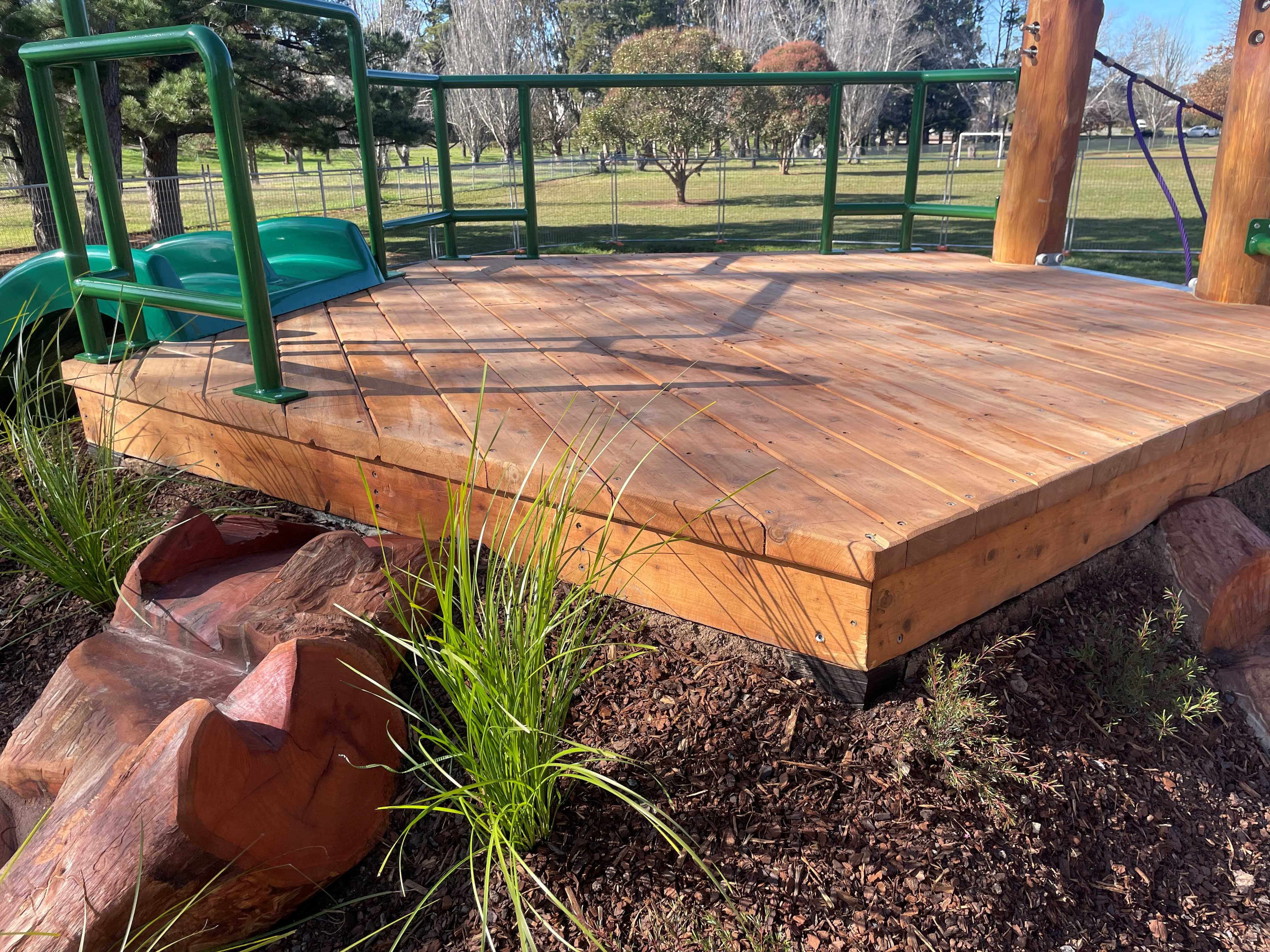 Wooden deck and outdoor slippery slide